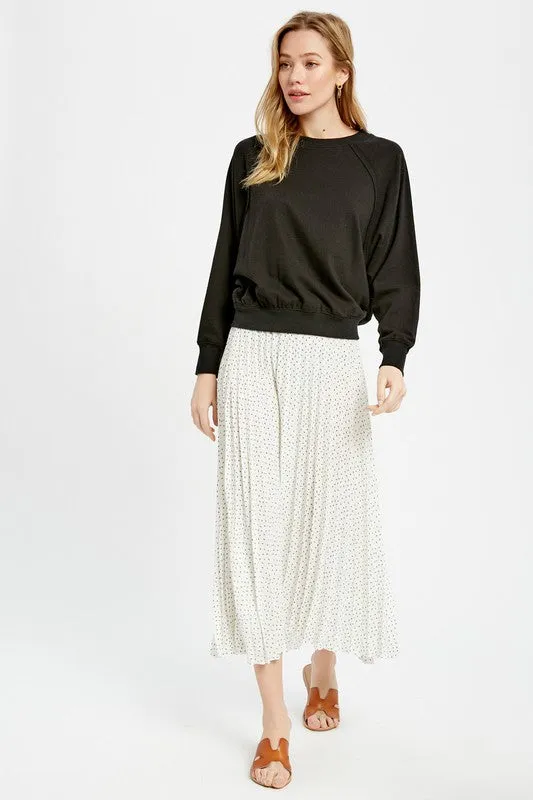 PLEATED POLKA DOT MIDI SKIRT
